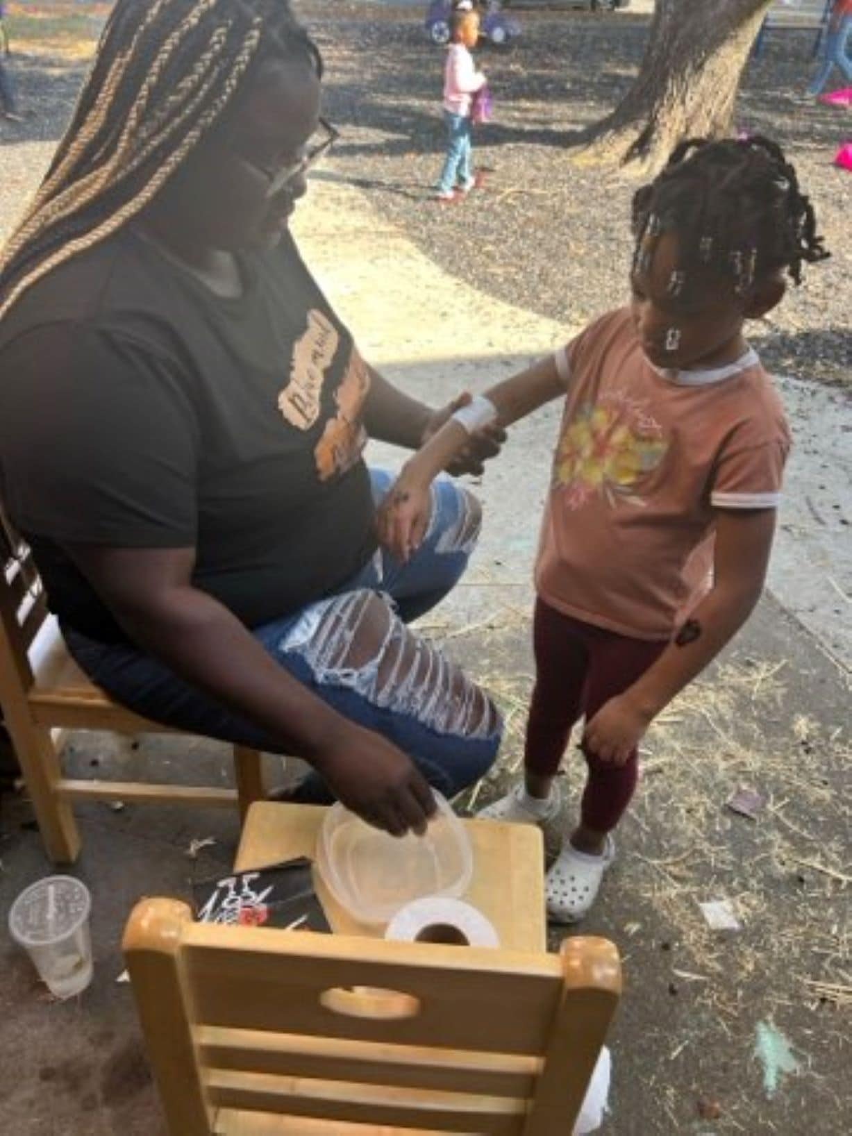 throwback of student enjoying hand tattoos at St. Augustine field day 23'.